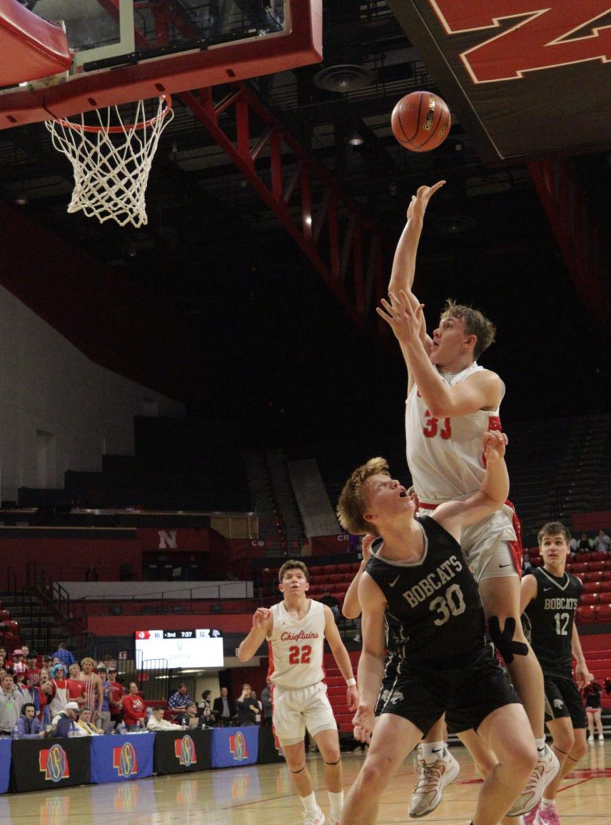 In the second quarter, sophomore Kale Hoffer attempts a jump stop. Hoffer was the leading player in field goal percentage with 60 percent.